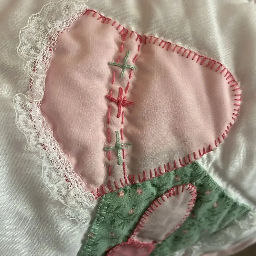 Handmade bonnet doll quilt